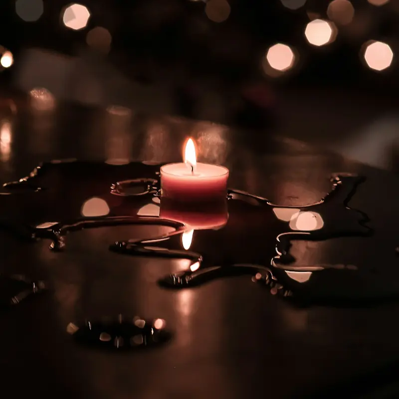 Candle reflected of water