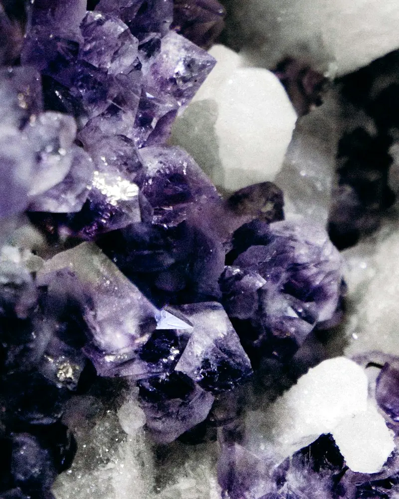 Close up picture of a crystal with some minerals.