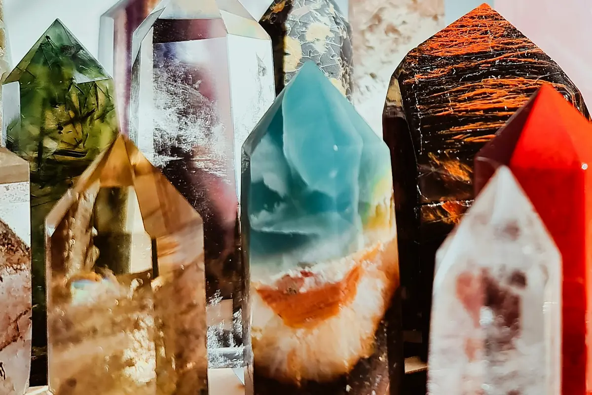 A selection of crystal points with vibrant colours.