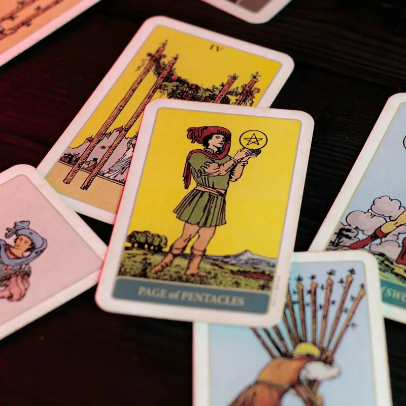 Rider Waite Tarot Card with the Page of Pentacles as the focus.