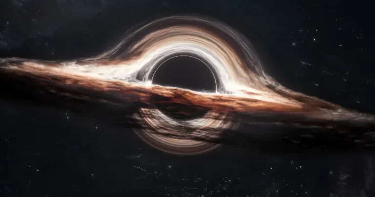 An image of a black hole with swirling patterns around it, symbolic of how our own energies absorb and reflect.